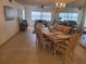 Bright dining room with table and chairs, view to living area at 1270 Gulf Blvd # 1102, Clearwater Beach, FL 33767