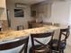 Modern kitchen featuring granite countertops and custom cabinetry at 1270 Gulf Blvd # 1102, Clearwater Beach, FL 33767