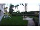 Landscaped lawn area with seating and shuffleboard at 1270 Gulf Blvd # 1102, Clearwater Beach, FL 33767