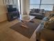 Living room featuring comfortable seating and ocean views at 1270 Gulf Blvd # 1102, Clearwater Beach, FL 33767