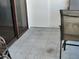 Small patio with tiled flooring and seating for two at 1270 Gulf Blvd # 1102, Clearwater Beach, FL 33767