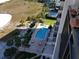 Aerial view showing pool and beach access at 1270 Gulf Blvd # 1102, Clearwater Beach, FL 33767