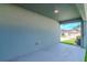 Covered back patio with concrete flooring and view of backyard at 13419 Lake Monroe Pl, Riverview, FL 33579