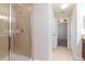 Bathroom with walk-in shower and tile flooring at 13419 Lake Monroe Pl, Riverview, FL 33579