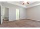 Bright bedroom with access to bathroom and laundry at 13419 Lake Monroe Pl, Riverview, FL 33579