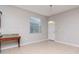 Bright dining area with tile flooring and an exterior door at 13419 Lake Monroe Pl, Riverview, FL 33579