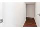 Clean hallway with hardwood floors and access to other rooms at 13419 Lake Monroe Pl, Riverview, FL 33579