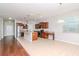 Kitchen with island, stainless steel appliances, and wood cabinets at 13419 Lake Monroe Pl, Riverview, FL 33579