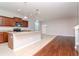 Kitchen with island, stainless steel appliances, and wood cabinets at 13419 Lake Monroe Pl, Riverview, FL 33579
