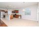 Kitchen with island, stainless steel appliances, and wood cabinets at 13419 Lake Monroe Pl, Riverview, FL 33579