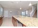 Modern kitchen with granite countertops and stainless steel appliances at 13419 Lake Monroe Pl, Riverview, FL 33579