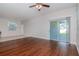 Living room with hardwood floors and sliding glass doors at 13419 Lake Monroe Pl, Riverview, FL 33579