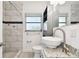 Clean bathroom with updated fixtures and shower/tub combo at 1829 West Dr, Clearwater, FL 33755