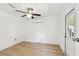 Bedroom with ceiling fan, A/C unit and exterior access at 1829 West Dr, Clearwater, FL 33755