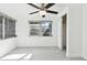 Spacious bedroom with ceiling fan and closet at 1829 West Dr, Clearwater, FL 33755