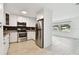 Modern kitchen featuring stainless steel appliances and white cabinetry at 1829 West Dr, Clearwater, FL 33755