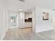 Modern kitchen with white cabinets, granite countertops, and stainless steel appliances at 1829 West Dr, Clearwater, FL 33755