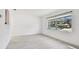 Bright and airy living room with hardwood floors and large windows at 1829 West Dr, Clearwater, FL 33755