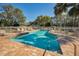 Sparkling community pool with ample lounge chairs at 1929 Northfork Cir, Clearwater, FL 33760