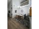 Charming dining room with hardwood floors and overhead lighting at 3077 Branch, Clearwater, FL 33760