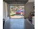 Two-car garage with open door, view of street and cars at 3077 Branch, Clearwater, FL 33760