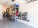Garage with storage shelves, washer, dryer, and folding table at 3077 Branch, Clearwater, FL 33760
