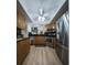 Kitchen boasts stainless steel appliances and wood cabinets at 3077 Branch, Clearwater, FL 33760