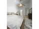 Main bedroom with king-size bed and ensuite bathroom access at 3077 Branch, Clearwater, FL 33760