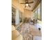Cozy screened porch, perfect for relaxing with outdoor furniture at 3077 Branch, Clearwater, FL 33760