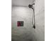 Modern shower with marble tile and black fixtures at 3077 Branch, Clearwater, FL 33760