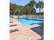 Inviting community swimming pool with surrounding lounge chairs at 3077 Branch, Clearwater, FL 33760