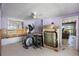 Needs renovation, features elliptical and damaged furniture at 4019 Helena Ne St, St Petersburg, FL 33703
