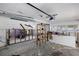 Unfinished garage interior with exposed walls and various items at 4019 Helena Ne St, St Petersburg, FL 33703