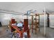 Unfinished garage with workbench and shelving at 4019 Helena Ne St, St Petersburg, FL 33703