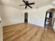 Bright living room with wood-look floors and ceiling fan at 4735 22Nd N Ave, St Petersburg, FL 33713