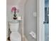 Small half bathroom with toilet and simple shelving unit at 4950 Pond Ridge Dr, Riverview, FL 33578