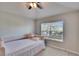 Bedroom with a daybed and a large window at 4950 Pond Ridge Dr, Riverview, FL 33578