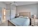 Bedroom with a double bed and access to another room at 4950 Pond Ridge Dr, Riverview, FL 33578