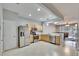 Modern kitchen with stainless steel appliances and light wood cabinets at 4950 Pond Ridge Dr, Riverview, FL 33578