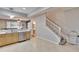 Modern kitchen with stainless steel appliances and light wood cabinets at 4950 Pond Ridge Dr, Riverview, FL 33578