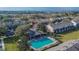 Community pool near townhouses and parking at 4950 Pond Ridge Dr, Riverview, FL 33578