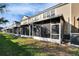 Row of townhouses with screened porches at 4950 Pond Ridge Dr, Riverview, FL 33578
