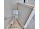 Staircase with chair lift providing convenient access at 4950 Pond Ridge Dr, Riverview, FL 33578