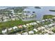 Aerial view showcasing waterfront property and neighborhood at 616 Lyons Ln, Longboat Key, FL 34228