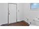 Simple bathroom with a toilet and space for updates at 616 Lyons Ln, Longboat Key, FL 34228
