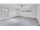 Simple bedroom with window and tile flooring, ready for personalization at 616 Lyons Ln, Longboat Key, FL 34228