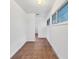 Spacious bedroom with tile flooring and ample closet space at 616 Lyons Ln, Longboat Key, FL 34228