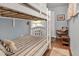 Cozy bedroom with a bunk bed, perfect for guests or children at 616 Lyons Ln, Longboat Key, FL 34228