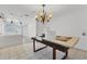 Spacious dining area with a large wooden table, ready for your personal touch at 616 Lyons Ln, Longboat Key, FL 34228
