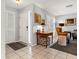 Inviting entryway with tiled floor and a view into the living room at 616 Lyons Ln, Longboat Key, FL 34228
